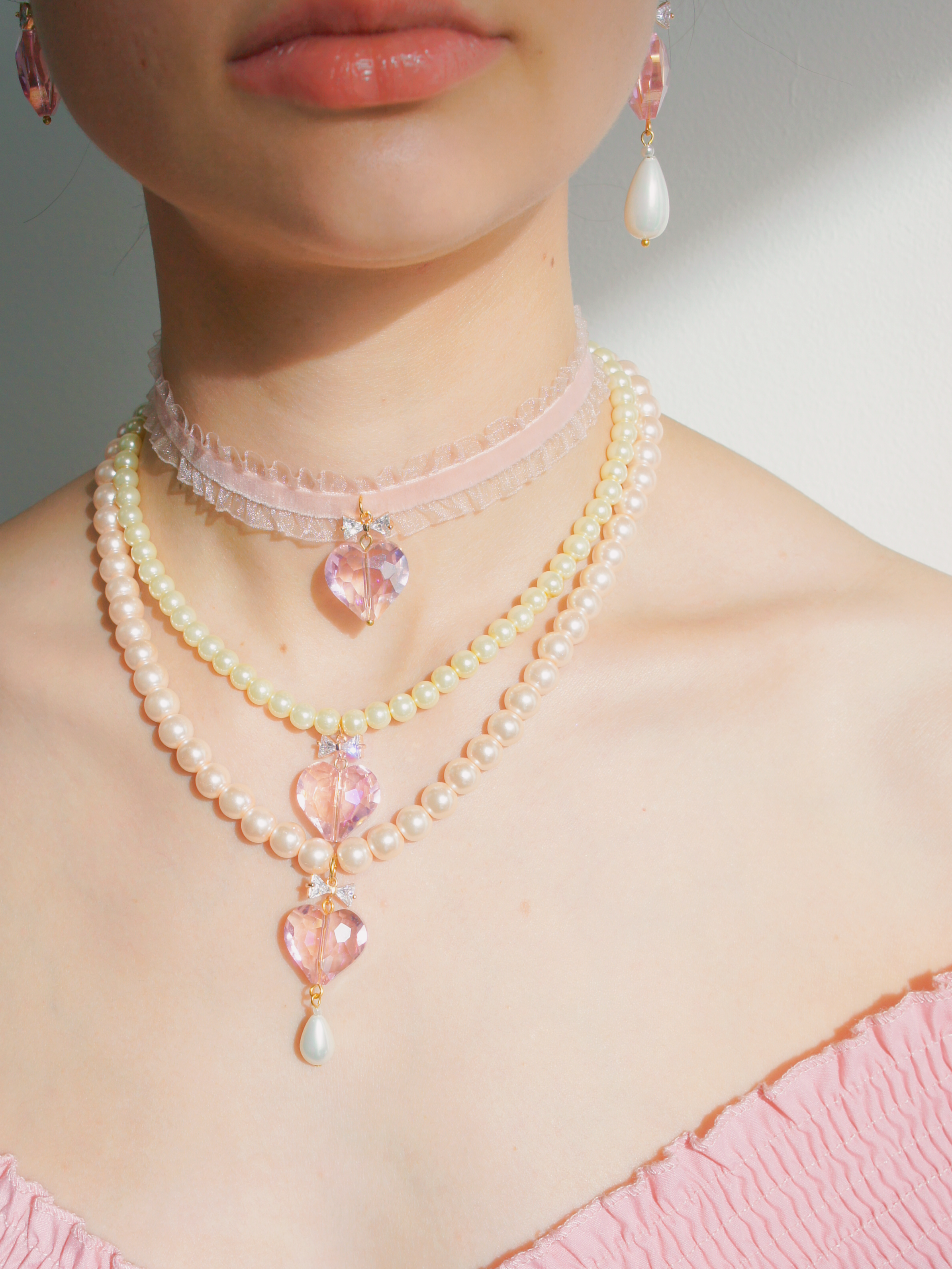 Whisper of Heart Pink Faux Pearl Necklace with Crystal Bow and Faceted Heart Pendant