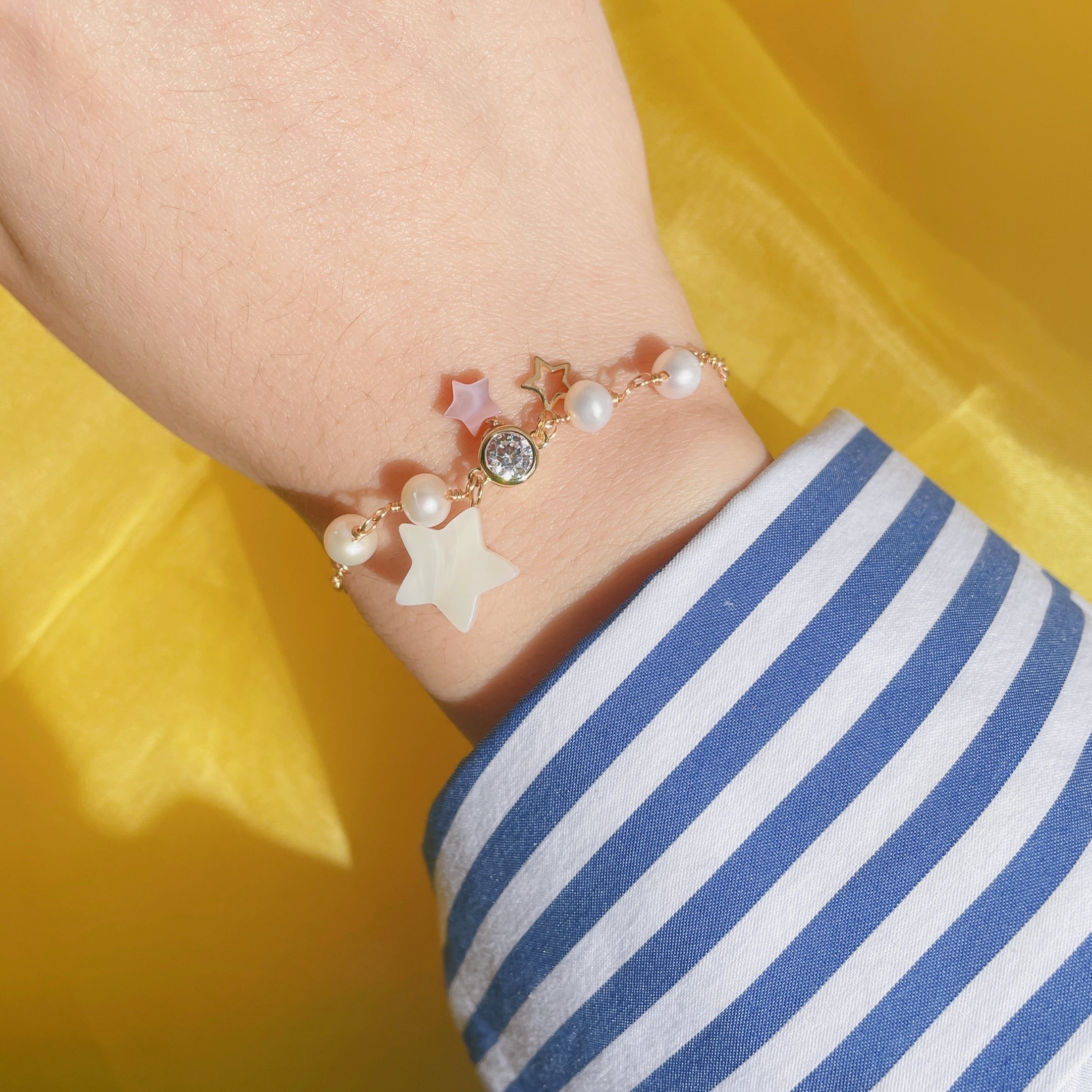 Starlight Freshwater Pearl Bracelet with Mother of Pearl Star Charms